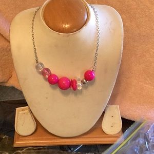 Women red necklace with matching earrings